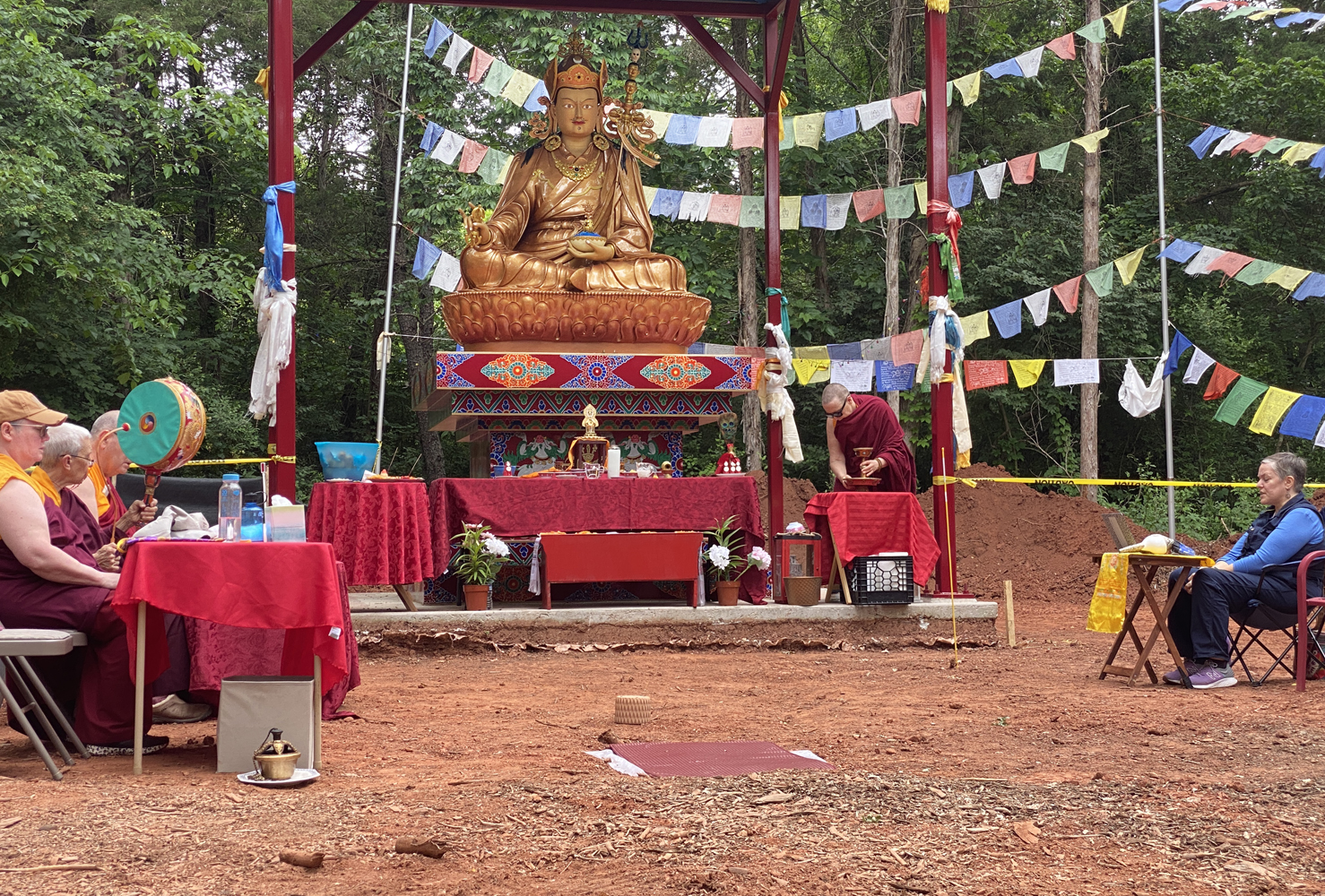 Puja at Guru statue-web