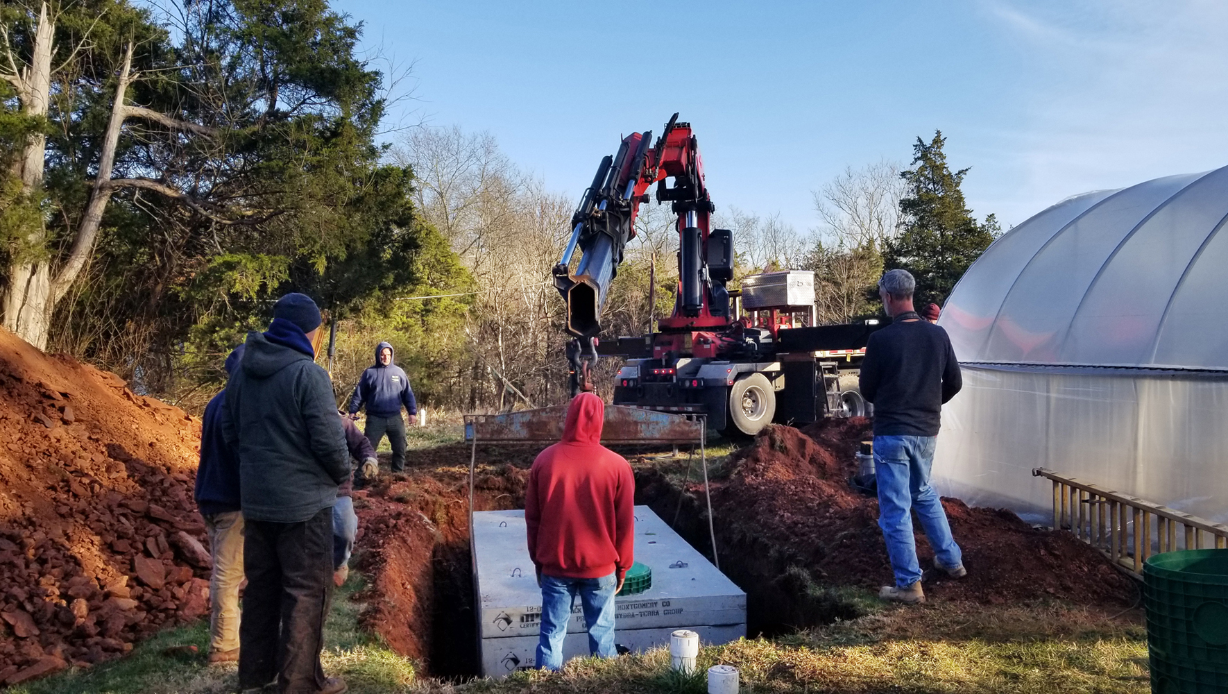 Installing new septic tank place-web