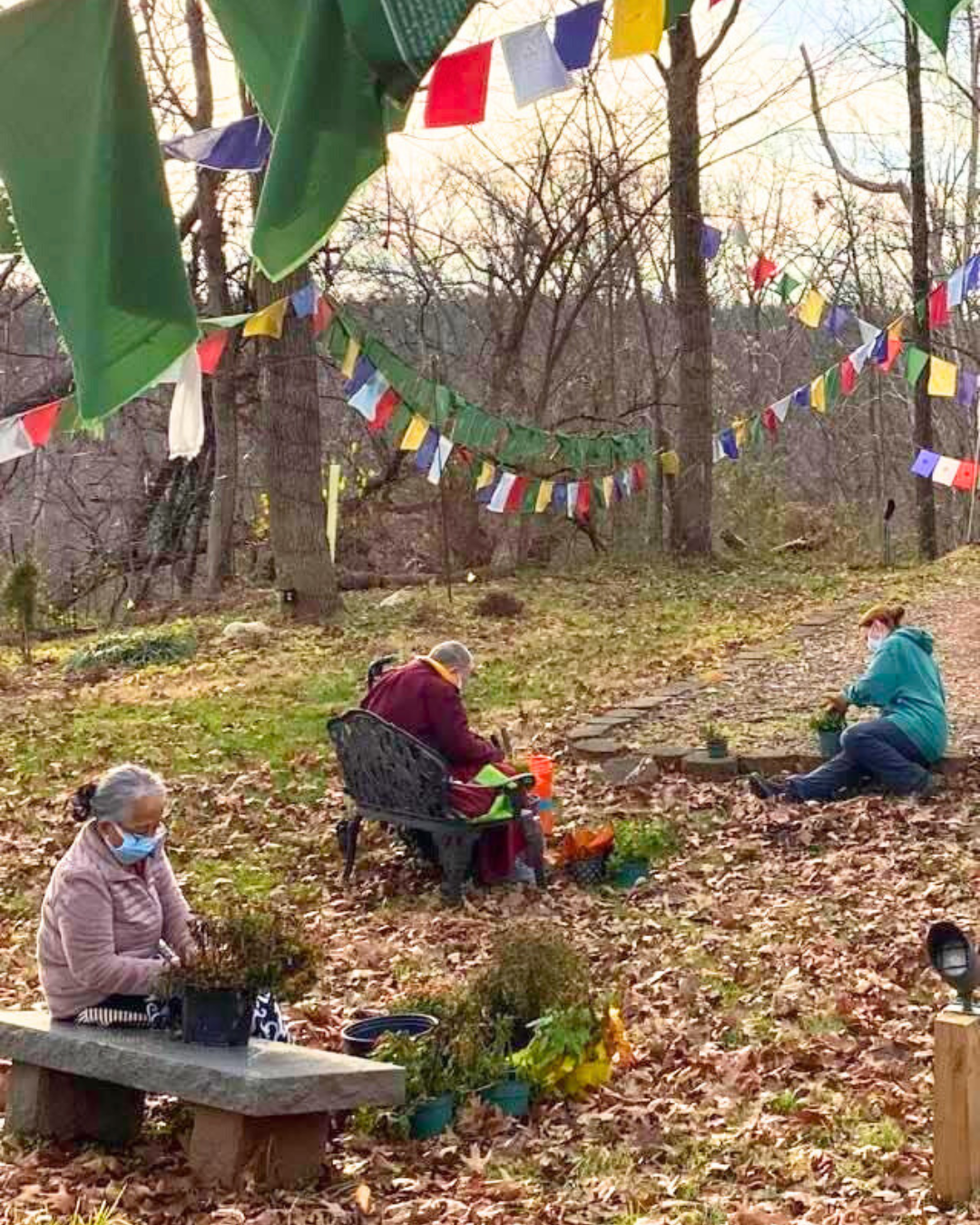 fall volunteers Volunteers working by the Enlightenment Stupa on a fall day.